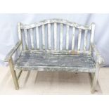 A teak garden bench, W122cm