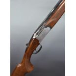Lincoln Premier 20 bore over and under ejector shotgun with engraved scenes of animals to the