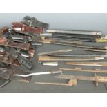 A small collection of bayonet related items comprising scabbards, frogs etc