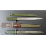 Two German Ersatz all steel bayonets, both with acceptance stamps, 31cm blades and scabbards, one