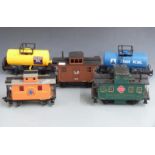Five Bachmann and similar G gauge vans and tankers including Chemical, Railway Express Agency,