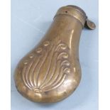 Copper and brass pistol or revolver powder flask with embossed decoration to both sides, 19cm long.