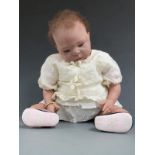 Laura Tuzio-Ross Reborn silicone doll with open mouth, blue eyes and brown hair, marked to the