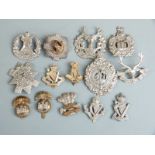 A small collection of regimental cap badges for Scottish and Irish regiments including Black
