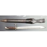 German 1898/05 pattern sawback bayonet, with part muzzle ring and flashguard, some clear stamps,