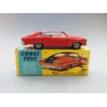 Corgi Toys diecast model Marlin Rambler Sports Fastback with red body, black roof and cream interior