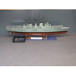 Remote controlled 1:96 scale model of HMS Invincible with two water cooled electric motors,