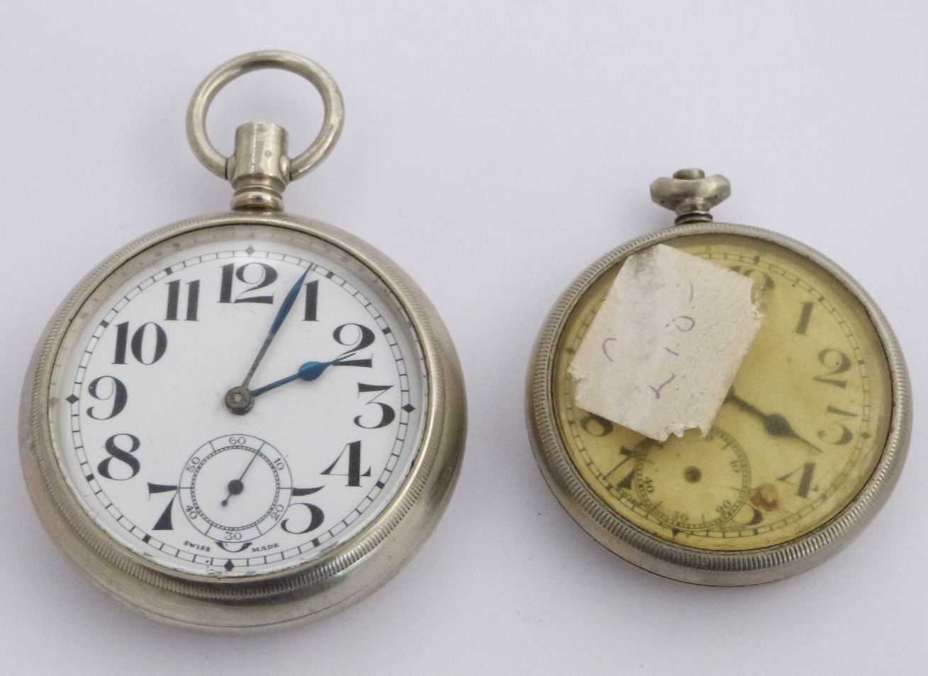 Two London Midland and Scottish railway keyless winding open faced pocket watches each with