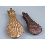 Two copper and brass powder flasks both with embossed decoration to each side, largest 20.5cm long.