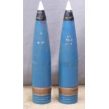 Two British Royal Navy 4.5 inch Mk8 gun practice rounds with fuses marked plug No5 Mk1 TRE76