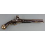 Flintlock hammer action pistol with brass trigger guard, butt cap and mounts, brass tipped wooden