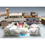 A collection of Tri-ang and similar 00 gauge model railway buildings and accessories.