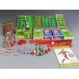 A collection of Subbuteo table soccer teams and accessories including Brazil, West Ham, Newcastle,