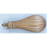 Dixon & Sons copper and brass powder flask with reeded body and acanthus leaf decoration, 21cm long.