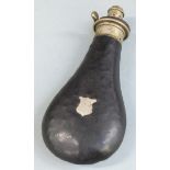 G & J W Hawksley leather covered powder flask with shield decoration, 20.5cm long.