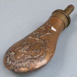 Copper and brass powder flask with embossed decoration featuring and eagle and motto 'Pluribus Unum'