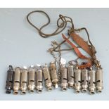 Thirteen military interest whistles including Hudson examples dated 1899, 1915, 1943 and 1953,
