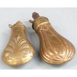 Two copper and brass pistol or revolver powder flasks both with embossed decoration to both sides,