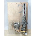 An electric metalworking/model making lathe mounted to wooden board AUCTIONEER TO ANNOUNCE  - THIS