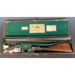 Cased William Powell & Son 12 bore sidelock side by side ejector shotgun with named and engraved