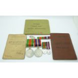 British Army WWII medals comprising War Medal and Defence Medal with miniatures and silver