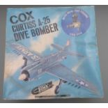 Cox Curtiss A-25 US Army Dive bomber with petrol engine, in original box with instructions.