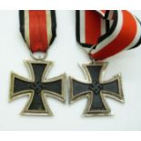 Two German Third Reich Nazi Iron Cross medals with ribbons