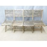 Set of four teak folding garden chairs