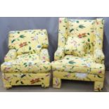 Two bespoke armchairs with yellow raised 'embroidery' style fabric decorated with flowers and