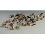 Twenty-six Britains and similar metal model cavalry soldiers.