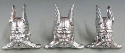 Three Rover car mascots formed as Vikings, two being pressed, one cast, height 8cm