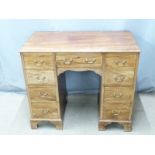 A mahogany twin pedestal ladies desk/dressing table with graduated drawers, W92 x D48 x H80cm