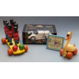 A collection of children's toys comprising Donald Duck Glen Clock animated clock with nodding