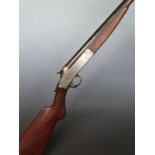 Harrington & Richards 20 bore single barrelled shotgun with semi-pistol grip ,named lock and 30 inch