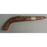 Percussion hammer action pistol with 9 inch graduated barrel, overall length 38cm.