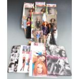 A collection of Spice Girls related dolls and books including Spice Girls on Tour, some in