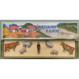 Britains Farm lead model figure set comprising girl, two cows, two rams and four sheep, 54F, in