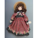 Linda Murray felt doll with painted features, stitched hands and soft body, in tartan dress, 73cm