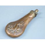 T Collins copper and brass powder flask with embossed decoration of game to both sides, 20.5cm long.
