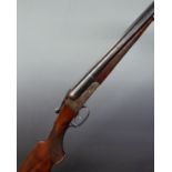 Baikal Model 54 12 bore side by side shotgun with engraved locks, trigger guard underside and top