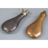 Two G & J W Hawksley powder flasks, one copper and brass the other steel, largest 20.5cm long.