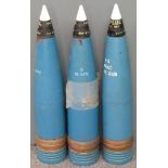 Three British Royal Navy 4.5 inch Mk8 gun practice rounds with fuses marked plug No5 Mk1 TRE76