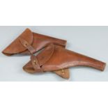 British Webley leather pistol or revolver holster 35cm long together with a similar example, 30cm