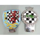 Gaunt car badge with green racing car against a chequered background together with a BARC badge