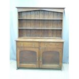 A late 19th/20thC oak dresser, W140 D48 H185cm