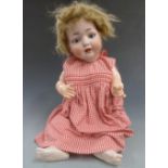 Heinrich Handwerck bisque headed doll with open mouth, weighted blue eyes, short blonde hair and