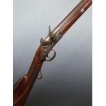 Muntz 16 bore flintlock hammer action gun with named and engraved lock, engraved hammer, top