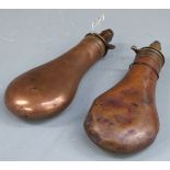 Two Sykes copper and brass powder flasks, largest 21cm long.