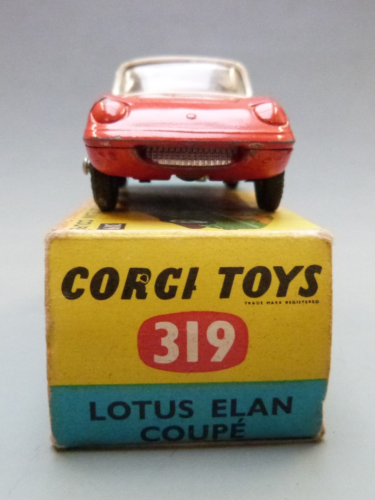 Corgi Toys diecast model Lotus Elan Coupe with red body, white top, white interior, cast hubs and - Image 5 of 5