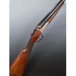 A Mino Spanish 12 bore side by side shotgun with engraved scenes of birds to the lock, engraved